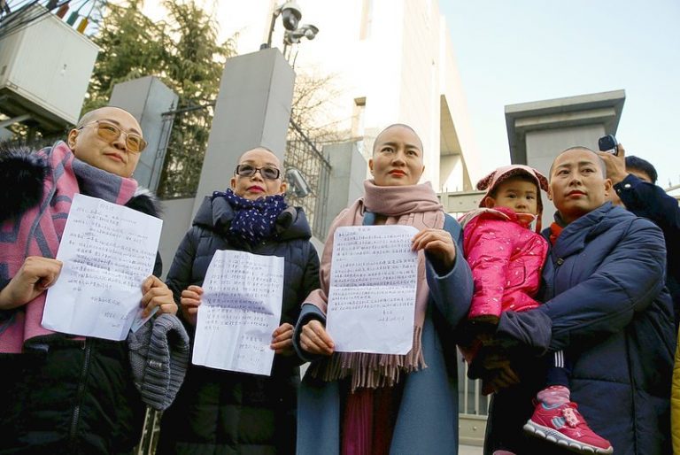 Chinese Wives Shave Heads In Protest Against Lawlessness INCPak