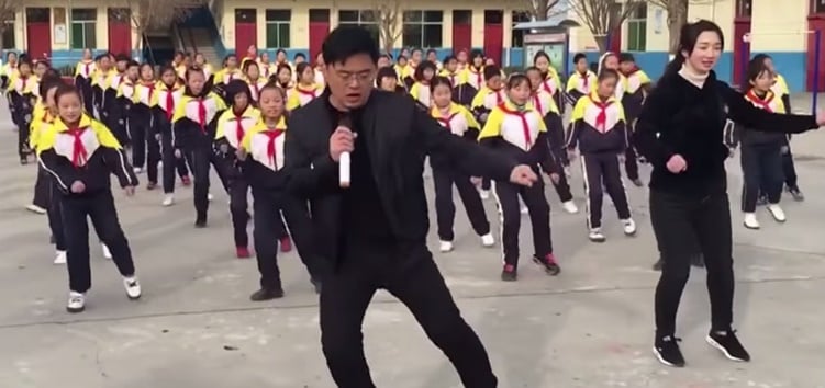 Chinese School Principal Shuffle Dance With Students