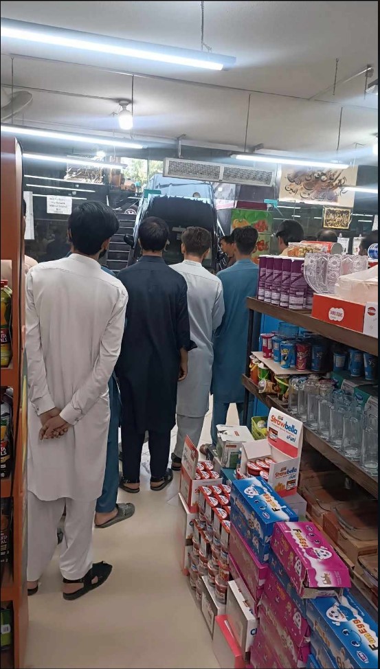 Underage driver crashes car inside a mart g-15 markaz islamabad